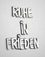 Wachsschriftzug Ruhe in Frieden Wachsschriftzug Ruhe in Frieden